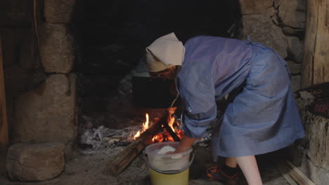 Cheesemaking,-Women-Streches-the-Tenili-Cheese-by-Hand,-Chobareti,-Georgia