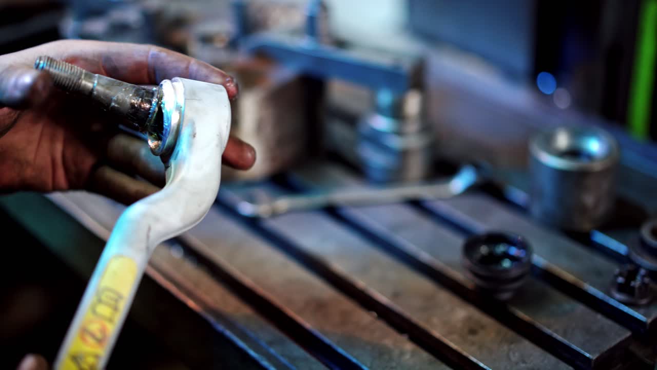 Worker at industry factory. Factory worker in the process of working