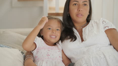 mother and daughter relaxing at home