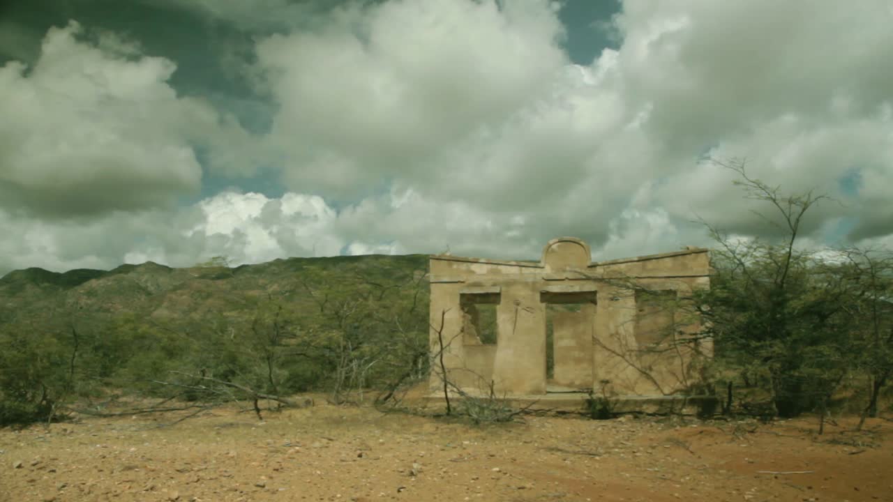 Wide shot of abandoned house facade at the Guajira Desert in Colombia