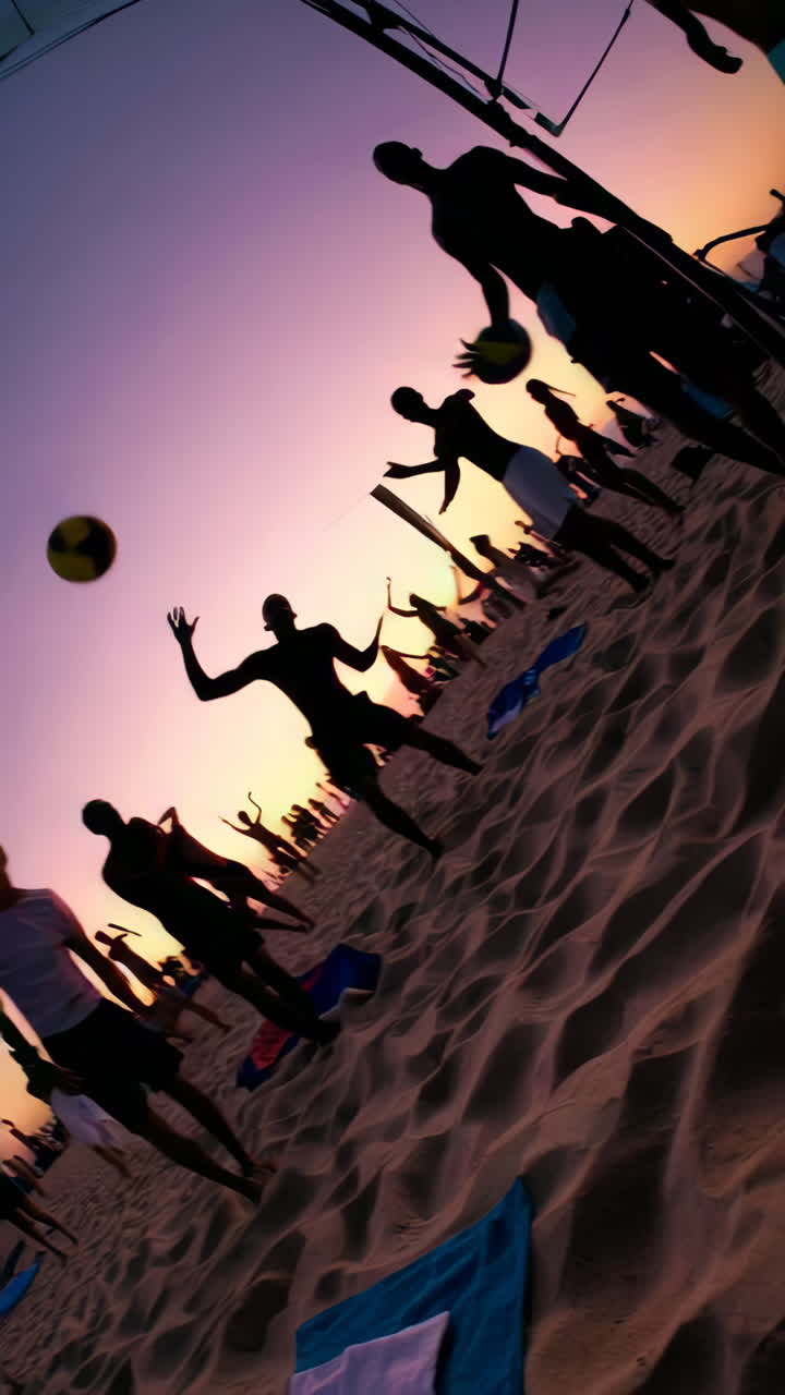 Beach volleyball at sunset