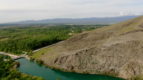 aerial view of mountain river with the dam