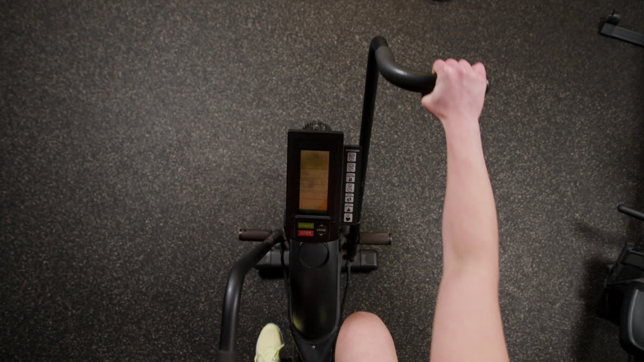 Person Exercising on an Arm Bike