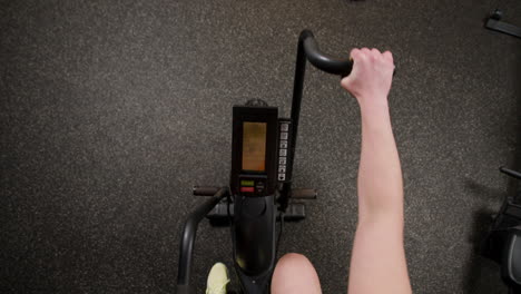 Person Exercising on an Arm Bike
