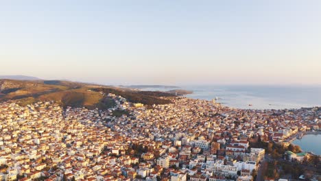 flying over the beautiful city of mytilene in lesvos island, greece at morning. - aerial drone shot