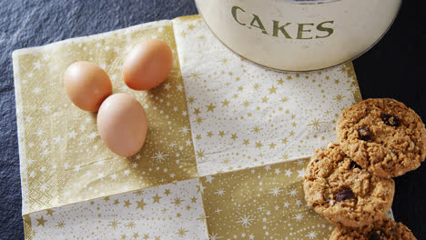 brown eggs and cookies on a decoration paper 4k