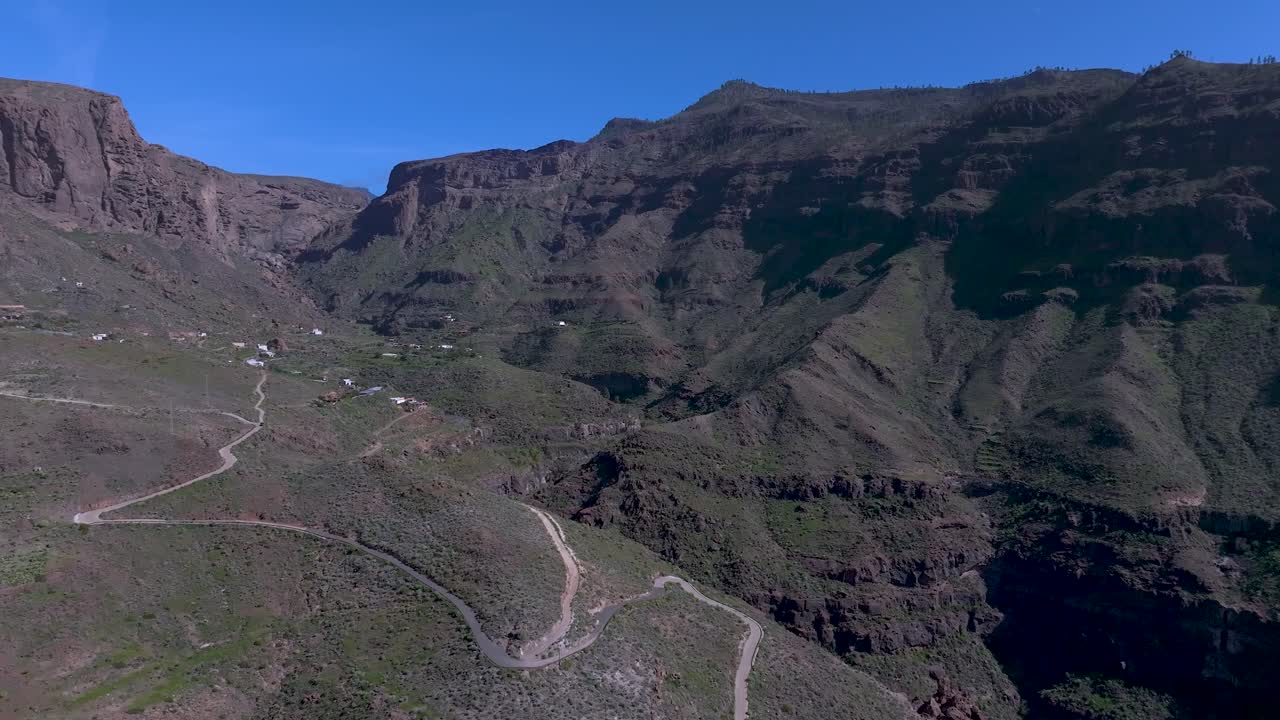Aerial view of Gran Canaria's volcanic mountains in sunny landscape