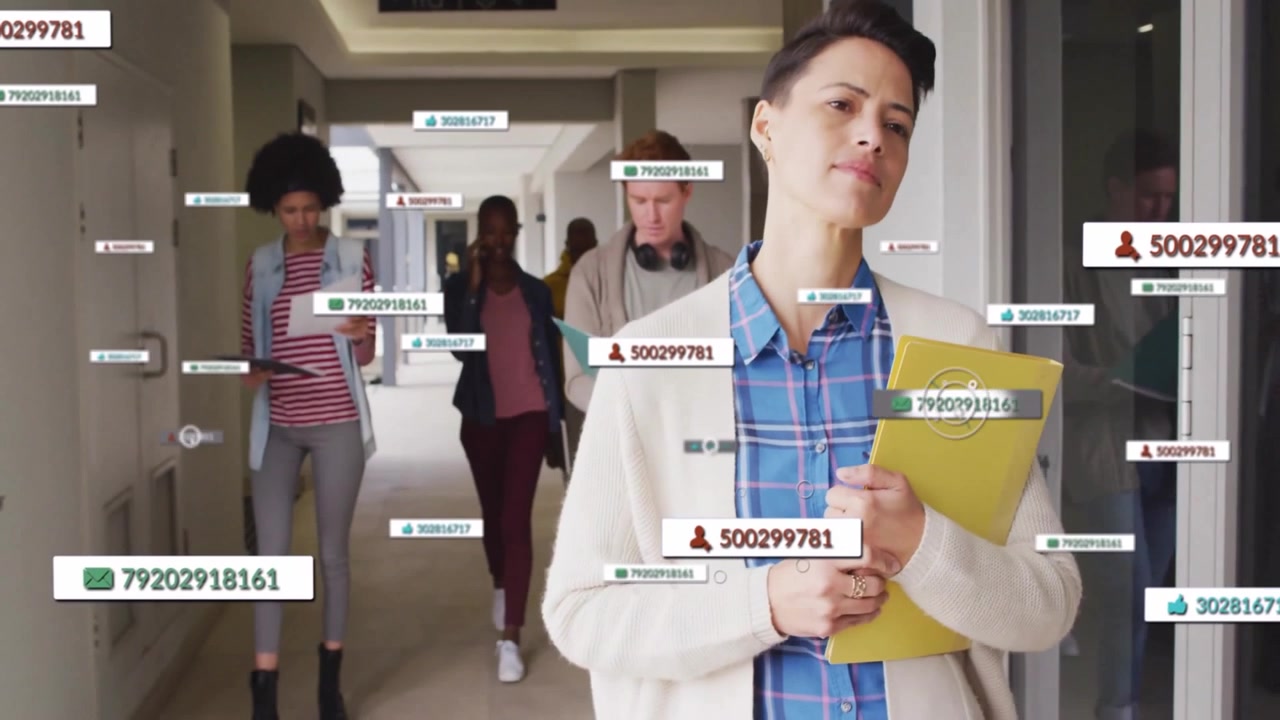 woman leading colleagues entering office corridor and activating floating ID overlays