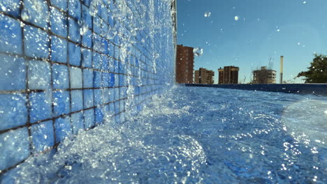 outdoor pool with waterfall in the town