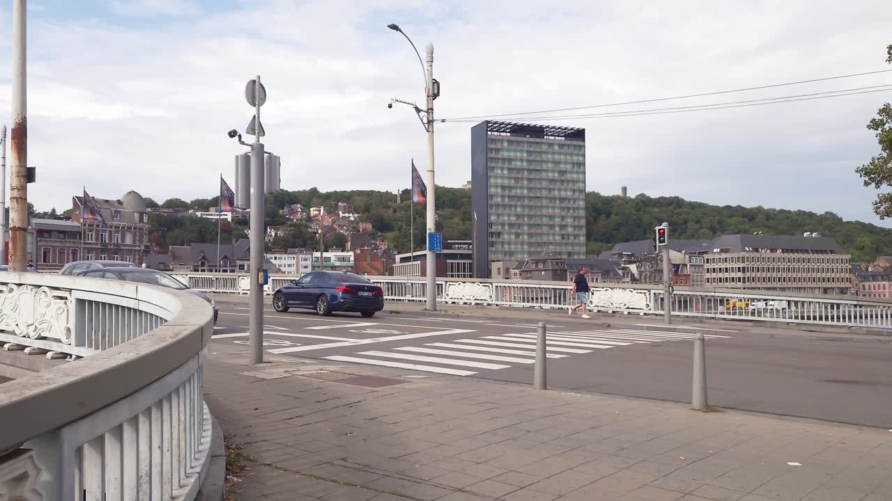 A Rushed Driver, Late for Work, Makes a U-turn in Liège, Belgium - Medium Shot