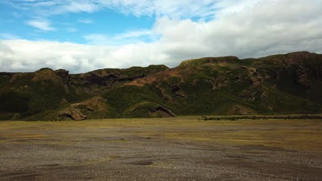 Aerial-landscape-view-of-a-mountain-valley,-in-the-Fimmvörðuháls-area,-Iceland