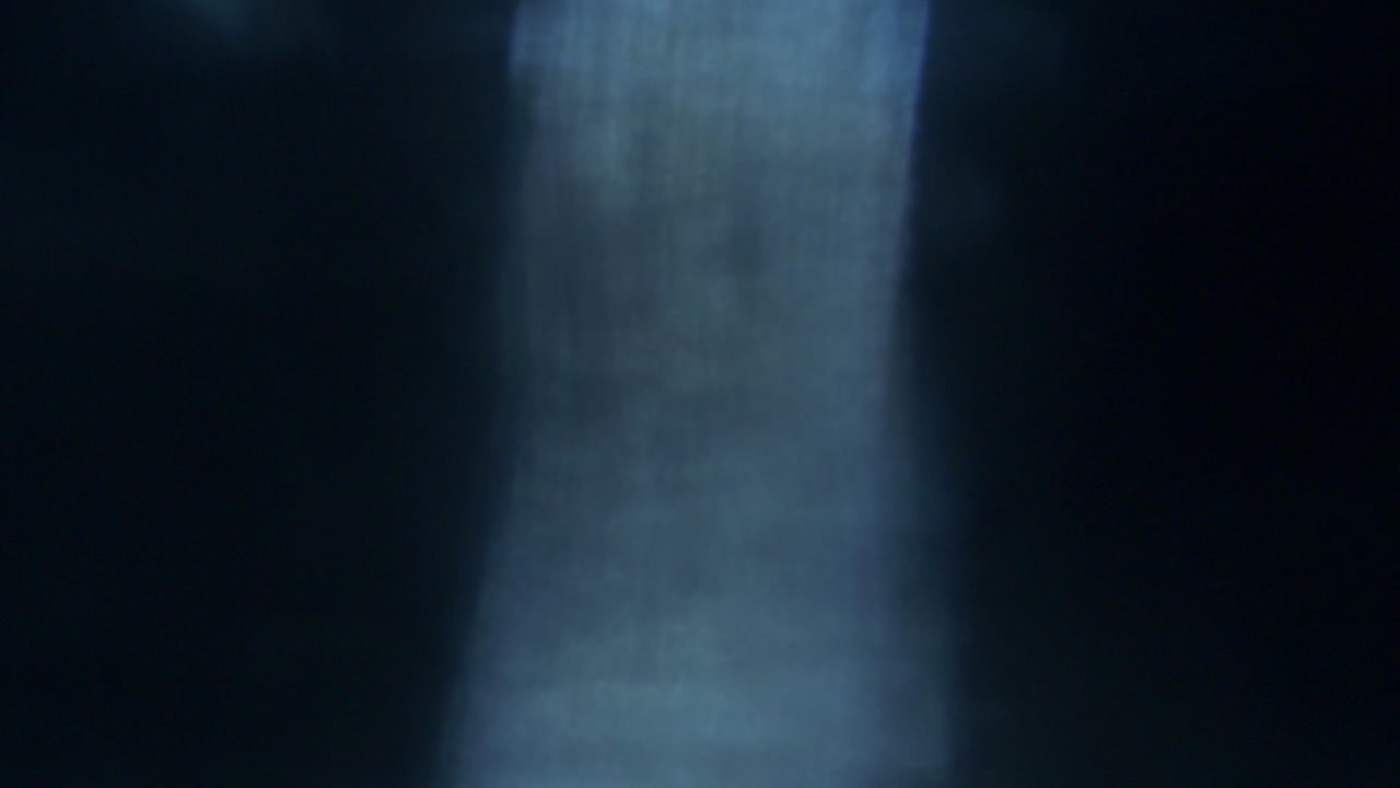 Abstract Blue Light Beams Moving on Dark Background