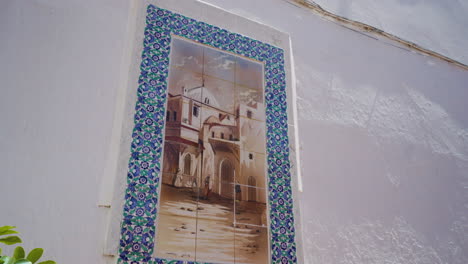 painting in tiled mosaic at the entrance of casbah of algiers in algeria