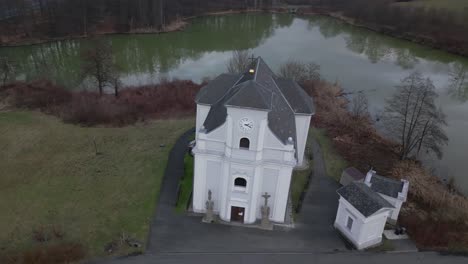 drone shot of a sloping church near karviná, in a coal mining area