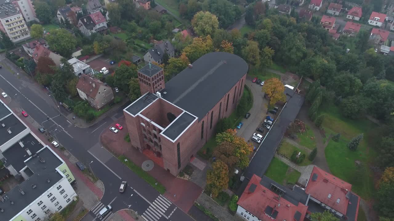 Aerial View of a Modern Brick Church in a Residential Area