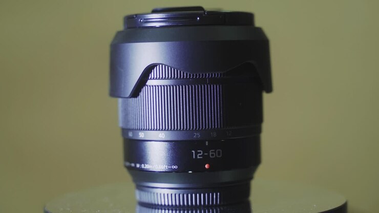 Camera crop lens, 12-60 zoom, 360 rotating, photography equipment, slow motion, close up shot, 4K