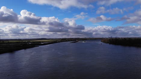 aerial view of oude maas river near puttershoek town in south holland, netherlands