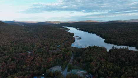 Aerial-View-Of-Forests-And-Pond-Near-Raquette-Lake-Hamlet-In-Hamilton-County,-New-York,-United-States