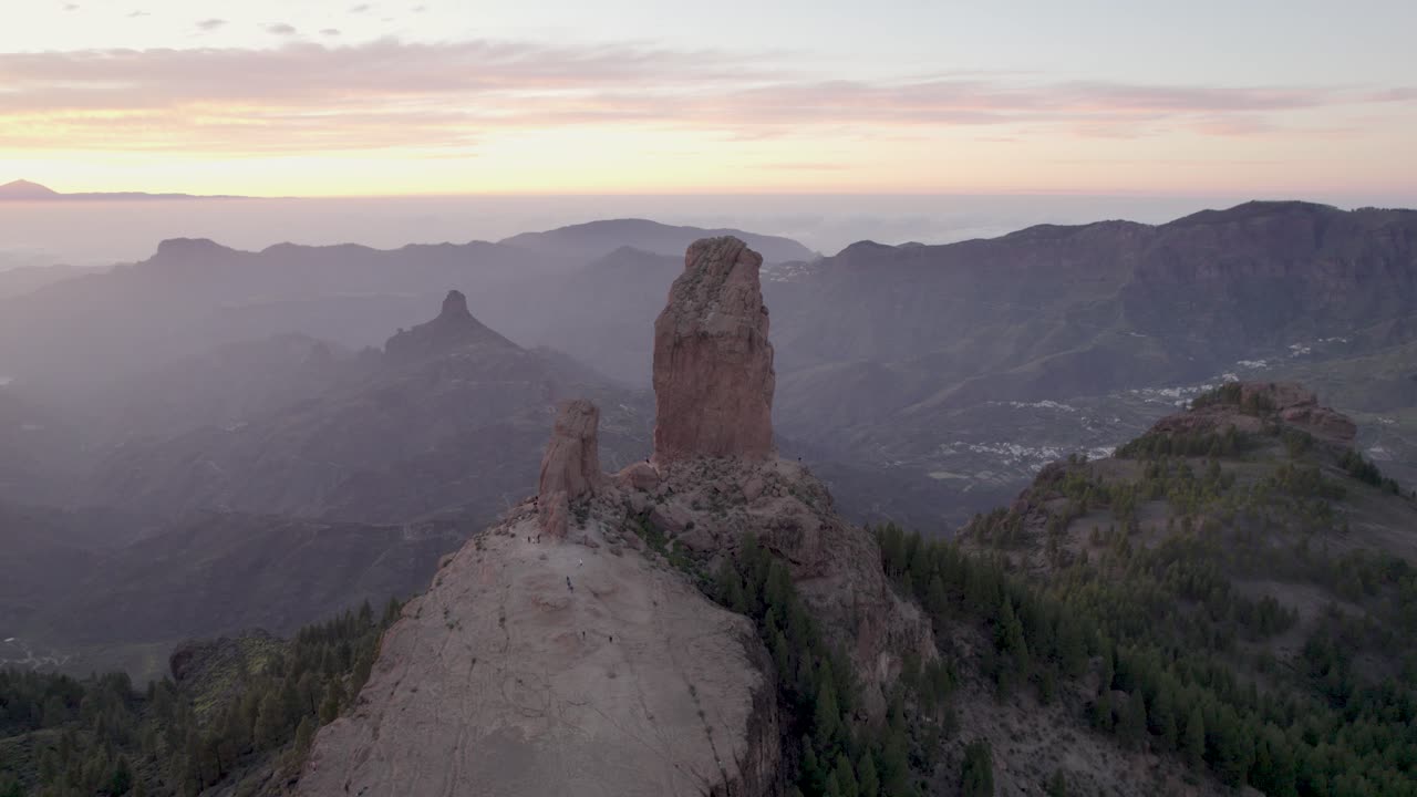 Circular drone flight around Roque Nublo at sunset in Gran Canaria.