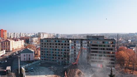excavator destroying building. bulldozer constructive demolition.