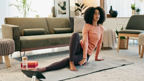 woman doing yoga at home