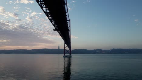 reveal shot of the lisbon suspension bridge