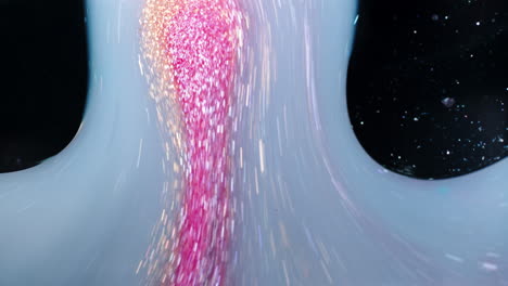 colorful liquids mixing in a close-up macro shot, creating abstract patterns and textures