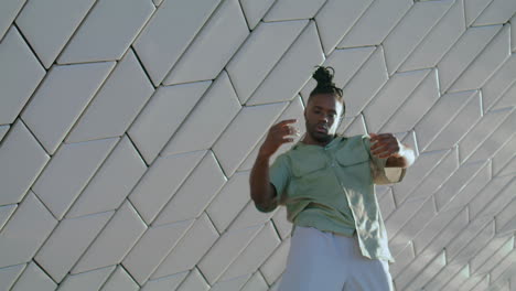 flexible person moving urban architecture vertical. guy freedom choreography