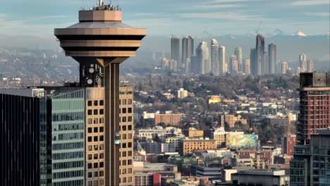 a view of the iconic harbour centre tower in cbd downtown vancouver, bc canada