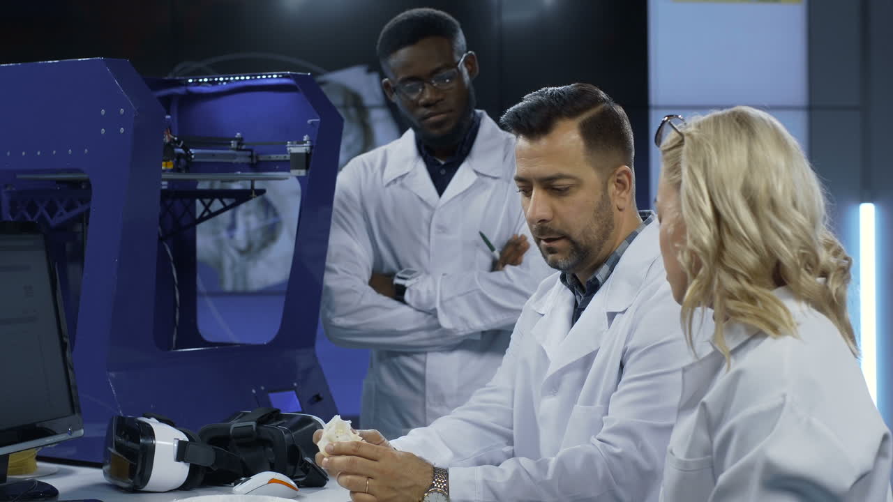 Scientists Collaborating on 3D Printing Project