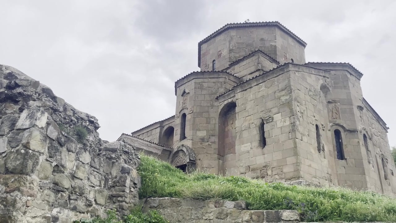 Close-up of the ancient stone walls and medieval architecture of Jvari Monastery in Mtskheta, Georgia. Sixth-century Georgian Orthodox monastery and UNESCO World Heritage site near Tbilisi