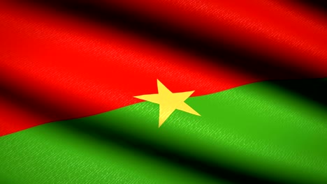 burkina faso flag waving textile textured background. seamless loop animation. full screen. slow motion. 4k video