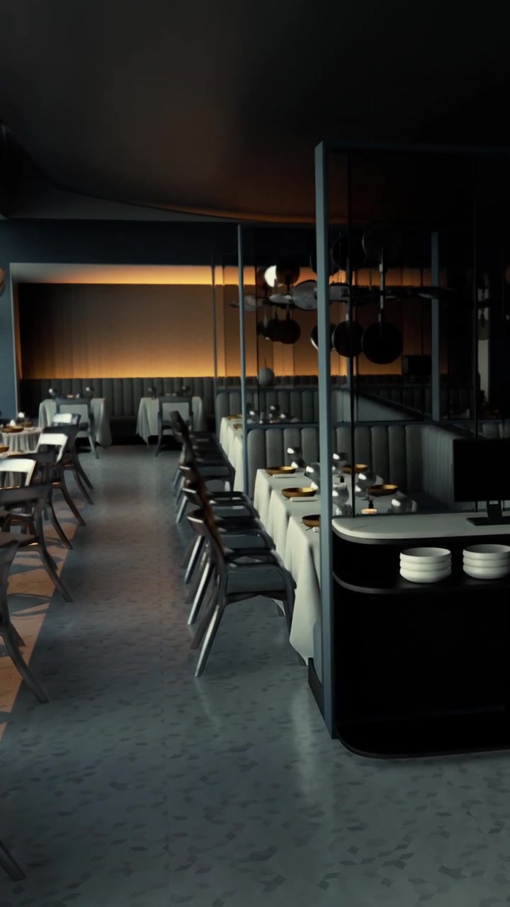 Moderne restaurantinteriør med borde og stole om aftenen.
