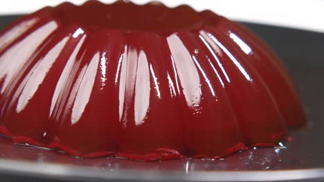 close-up of a red jelly dessert