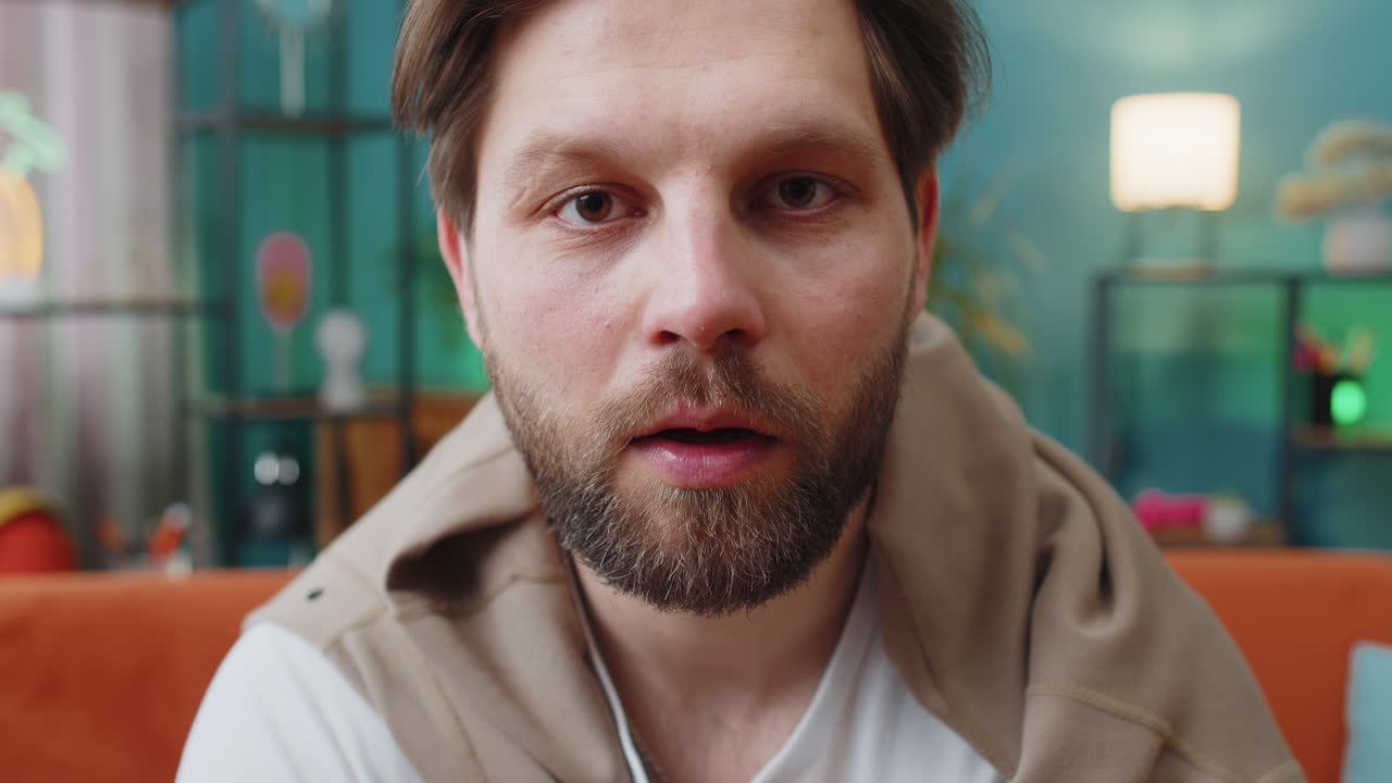 Excited caucasian man surprised shocked by sudden victory good win news celebrating wow reaction