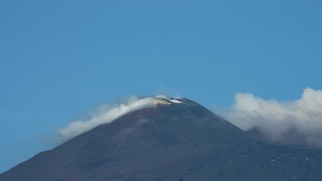 close shot of smoking mt. etna, volcano in sicily, italy