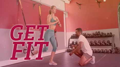 animation of get fit text over diverse man and woman exercising in gym