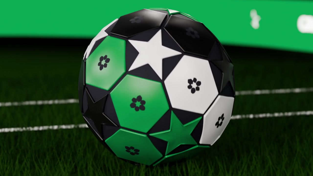 Roterende mønstret fodbold der afslører grønne stjernemotiver, mens kameraet trækker sig tilbage over græsset, promo