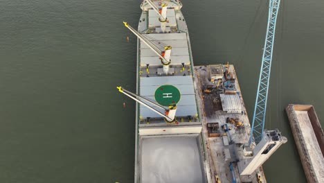 Aerial-of-vessel-being-loaded-with-rice-on-the-Mississippi-River