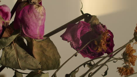 dried and wilted bouquet of red roses flowers