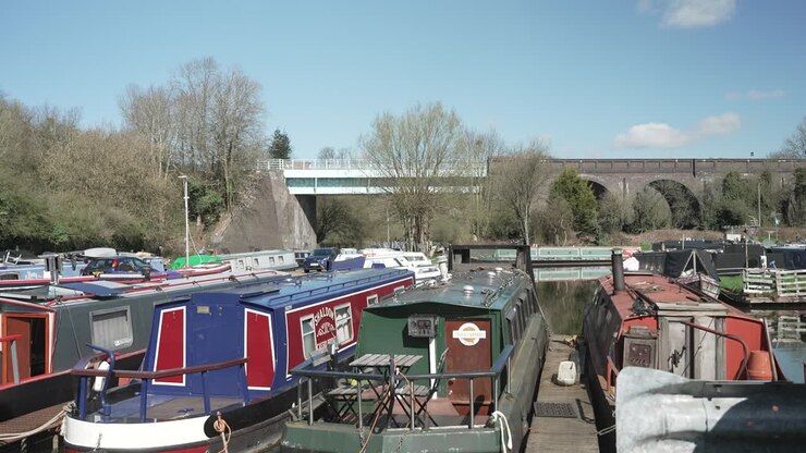 Residential Moored boats on a canal, homes on water