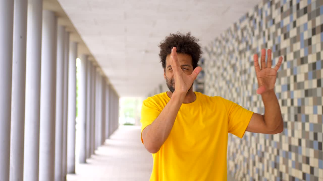 Man dancing in a tunnel