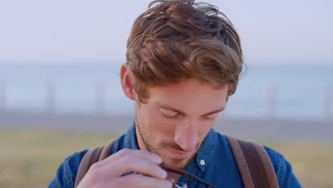 Face,-man-and-sunglasses-for-beach-travel