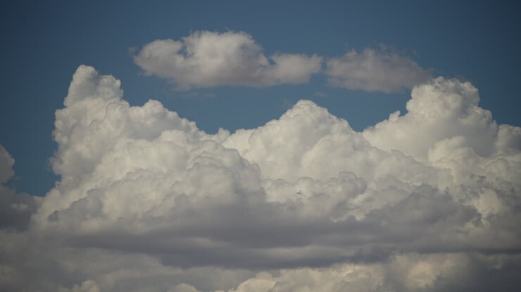 Cumulus cloud forming and dissipating - sky only cloudscape time lapse
