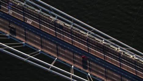 aerial view over cars on the verrazzano-narrows bridge, in ny, usa - cenital, drone shot