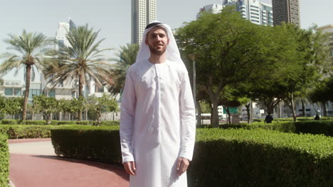 man with arabic clothing in the street