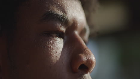 young african american male lips - face outside on sunny day, close up