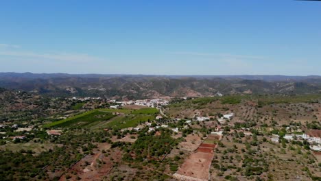 aerial view of a rural village in the hills