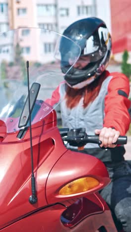 beautiful young woman motorcyclist