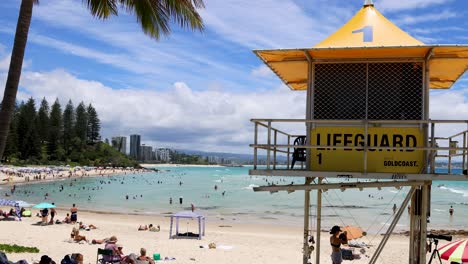 lifeguard tower on a crowded beach